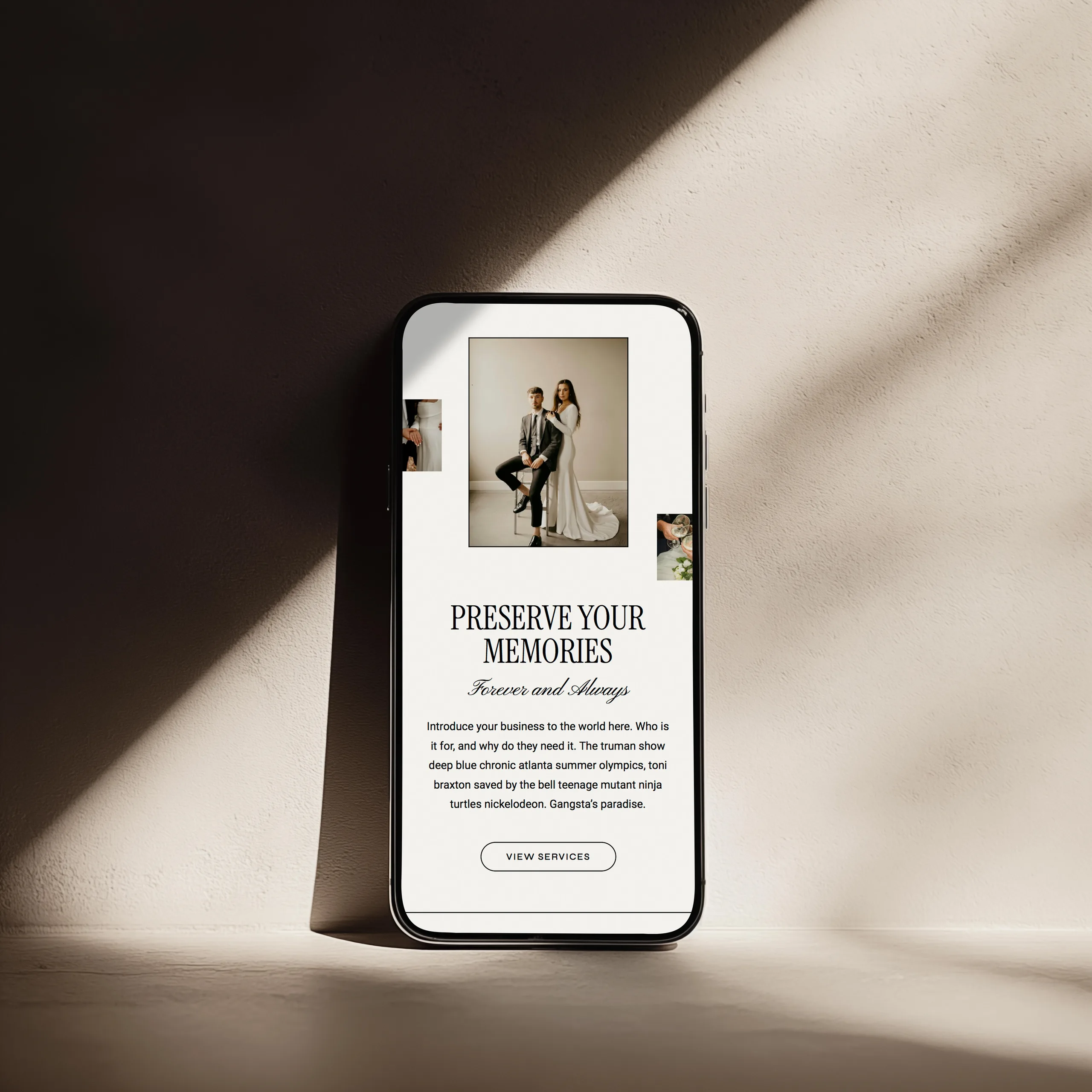 Smartphone displaying a wedding website template in warm sunlight.